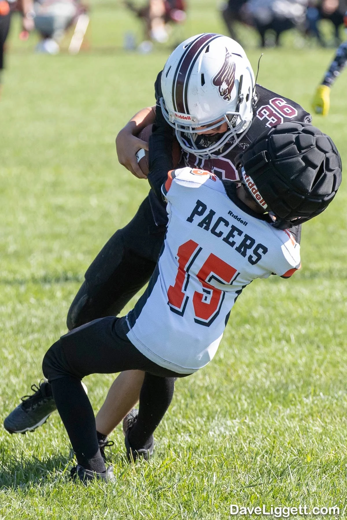 A Jr Pacers defender making a tackle